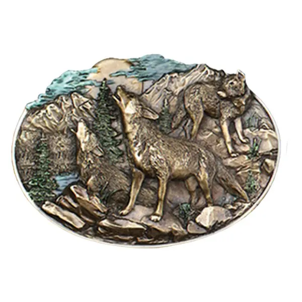 Belt Buckle Three Wolves in front of a Mountain Landscape